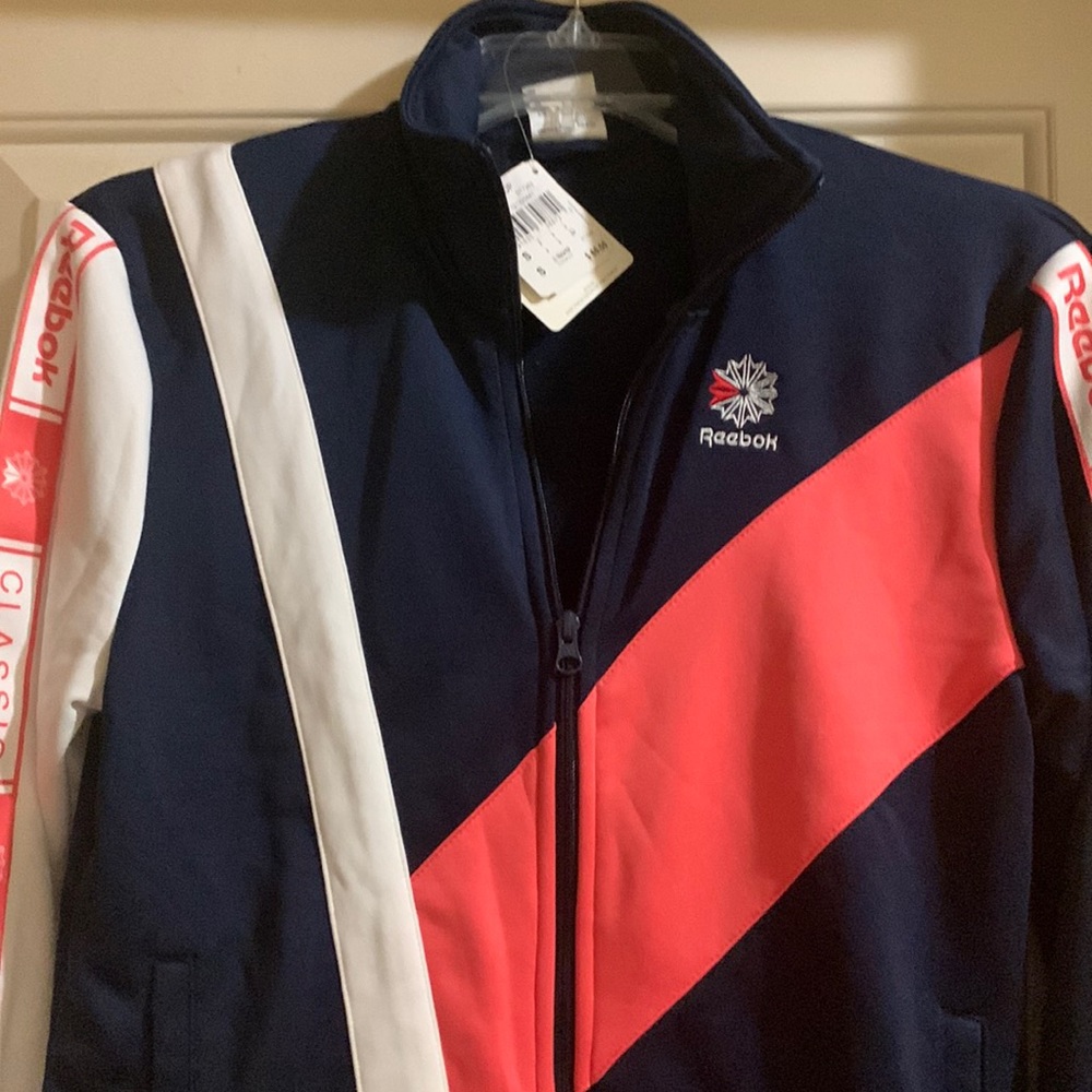 Brand new, never worn Reebok track jacket and pants